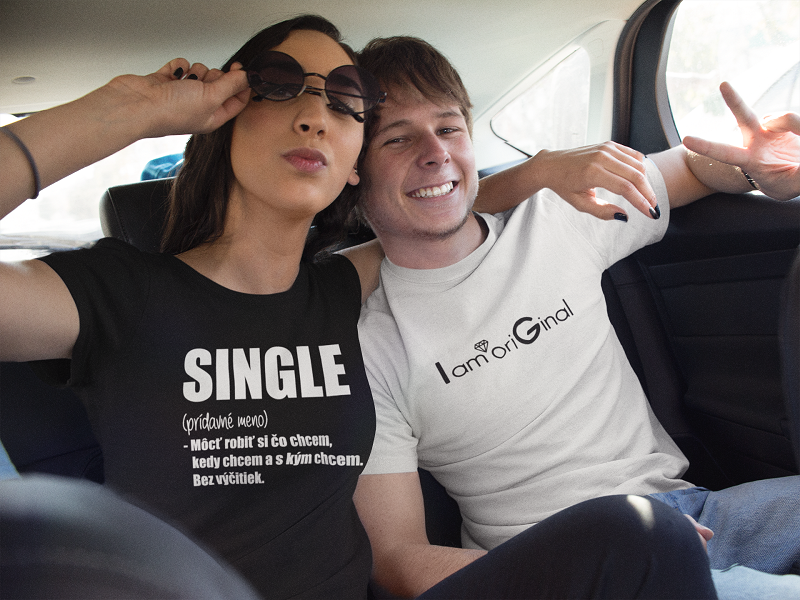 picture mockup of a girl and a guy wearing same t shirts while in the back of a car a13387
