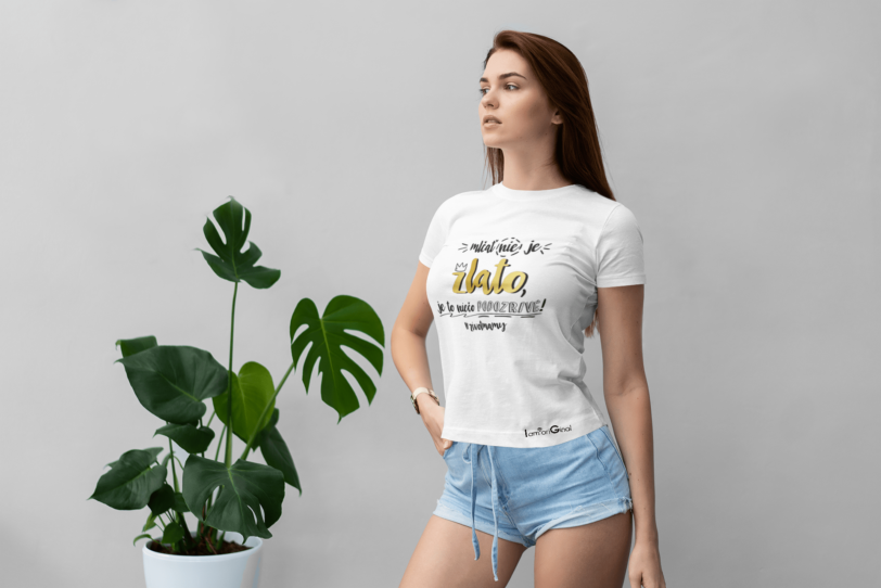 mockup of a serious woman wearing a t shirt and posing by a tropical plant 4288 el1 1
